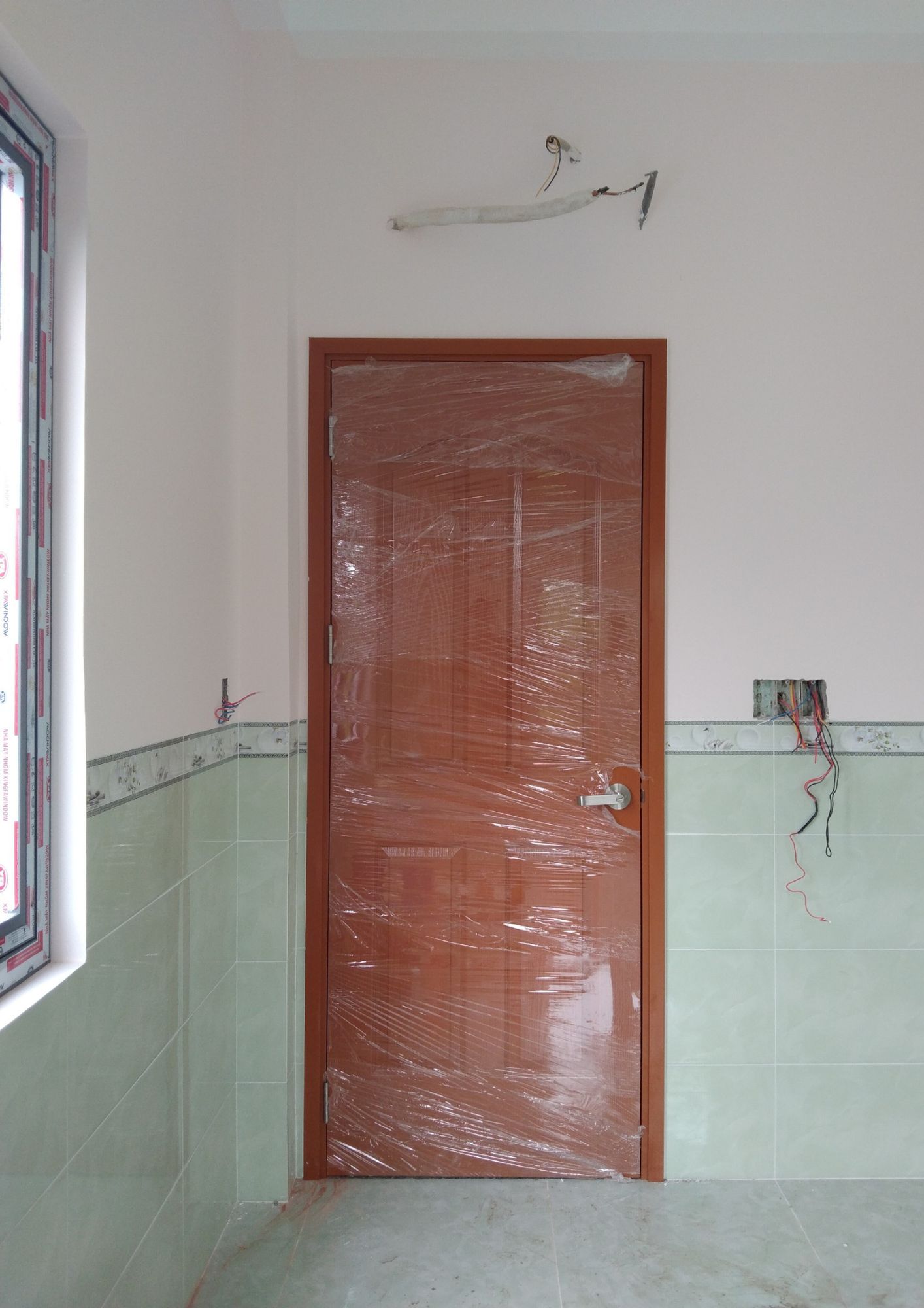 Mẫu cửa gỗ phòng ngủ đẹp tại Quận 2