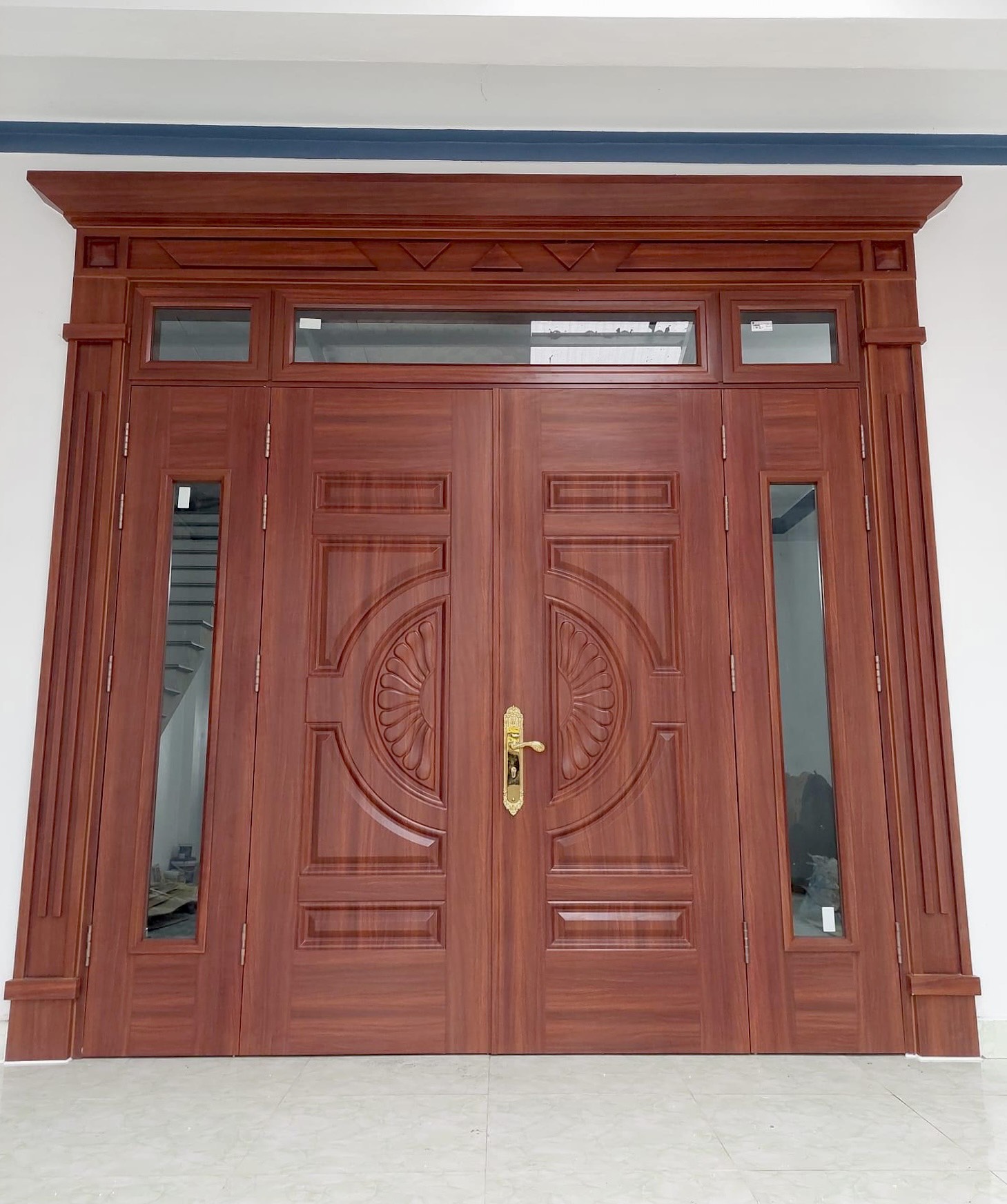 Giá cửa thép vân gỗ tại Dĩ An T6/2026 - Kotdoor 13 Giá cửa thép vân gỗ tại Dĩ An - mẫu cửa 4 cánh Luxury