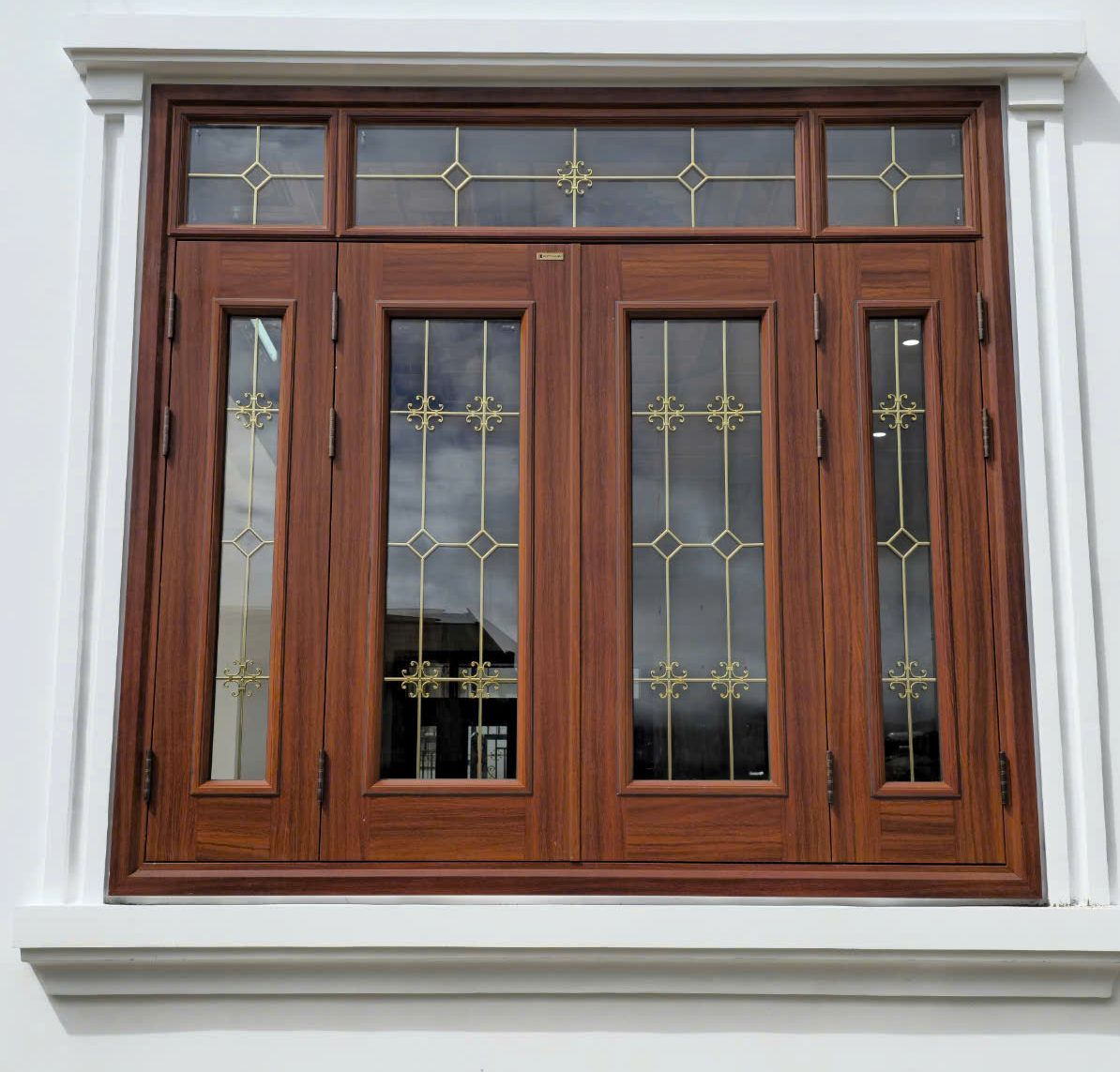 Giá cửa thép vân gỗ tại Bình Tân - Mẫu cửa sổ 4 cánh