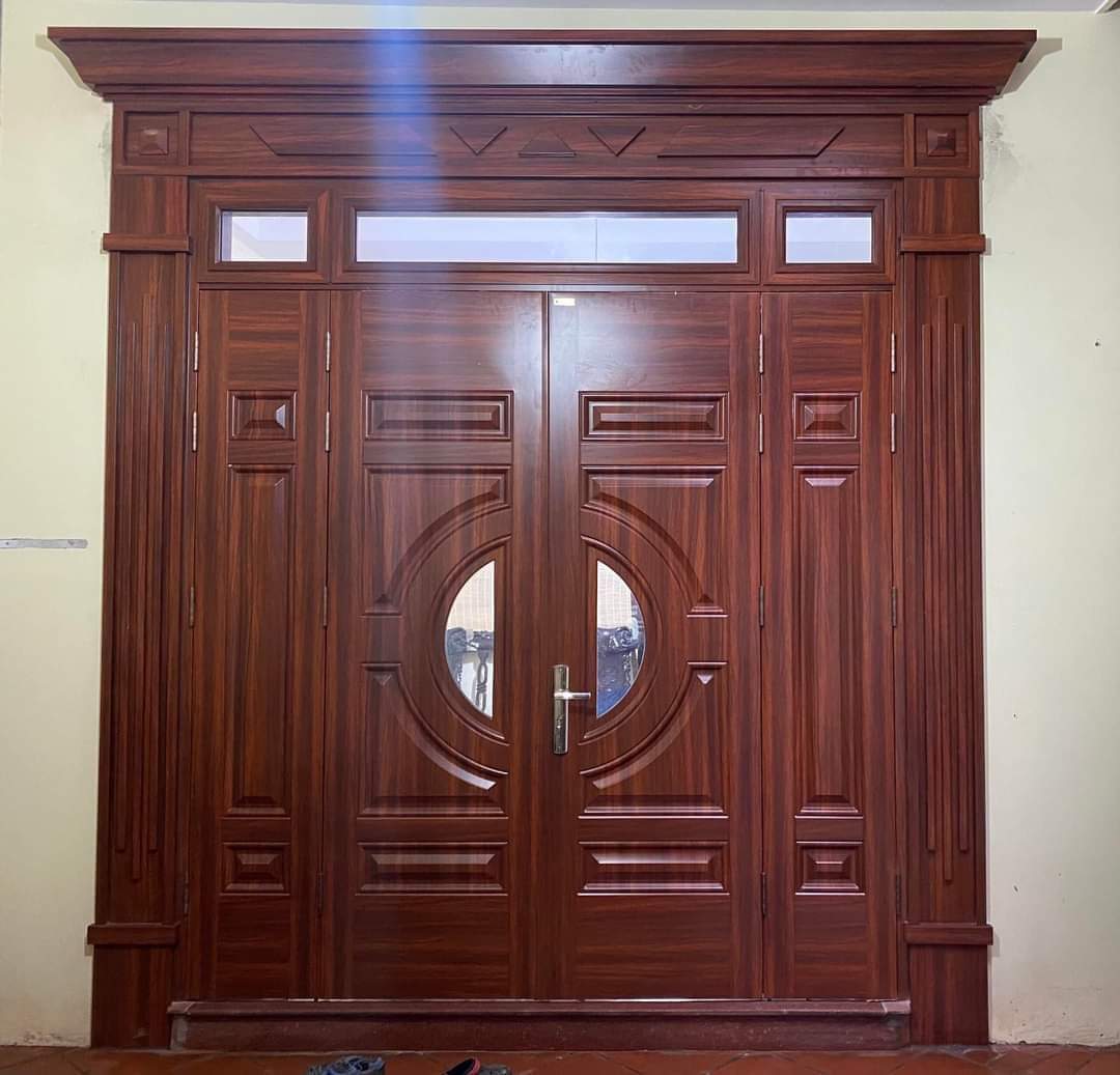 Giá cửa thép vân gỗ tại Dĩ An T6/2026 - Kotdoor 14 Giá cửa thép vân gỗ tại Dĩ An - mẫu cửa 4 cánh Luxury